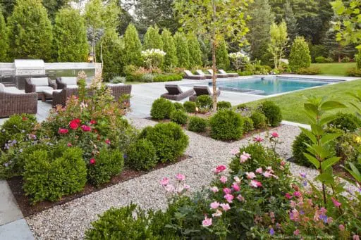 Weston MA, pea stone paths with pool backyard