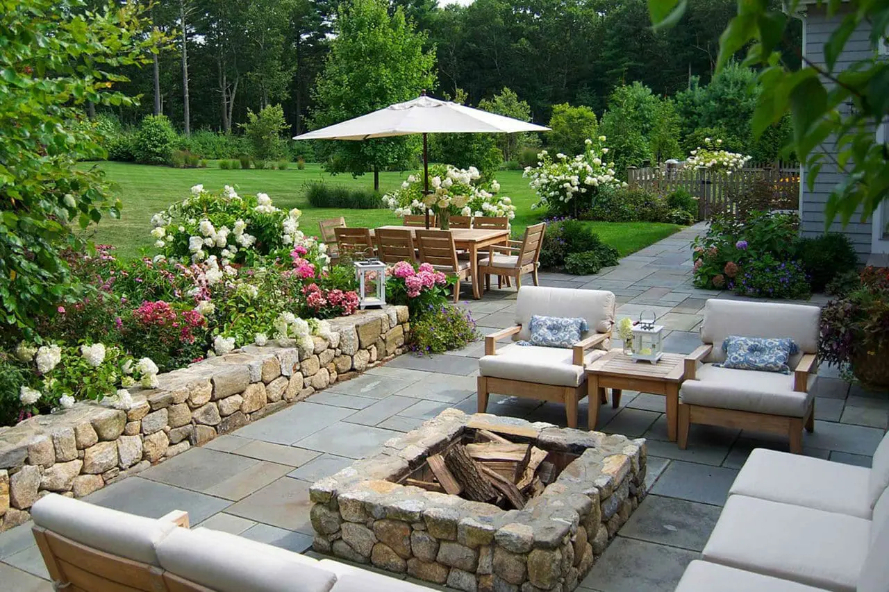A built-in wood burning fire pit creates a relaxing area to gather around.