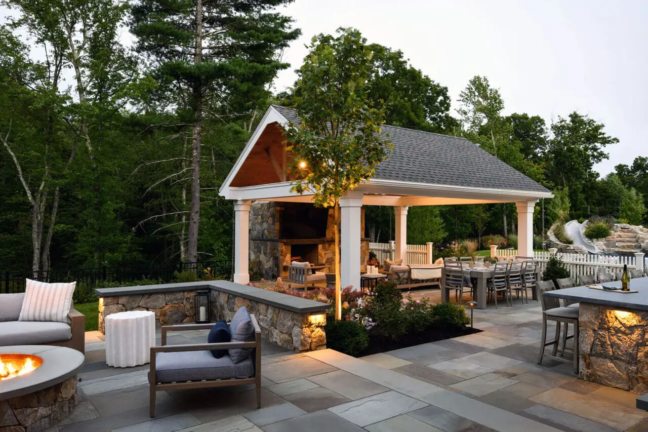 Poolside pergola adds visual rhythm and sun relief, defining lounging zones while integrating clean lines with hardscape and water features.