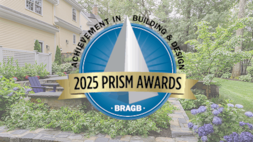 2025 BRAGB PRISM Awards graphic over a Wellesley residential landscape with stone walls, hydrangeas, and mature garden plantings.