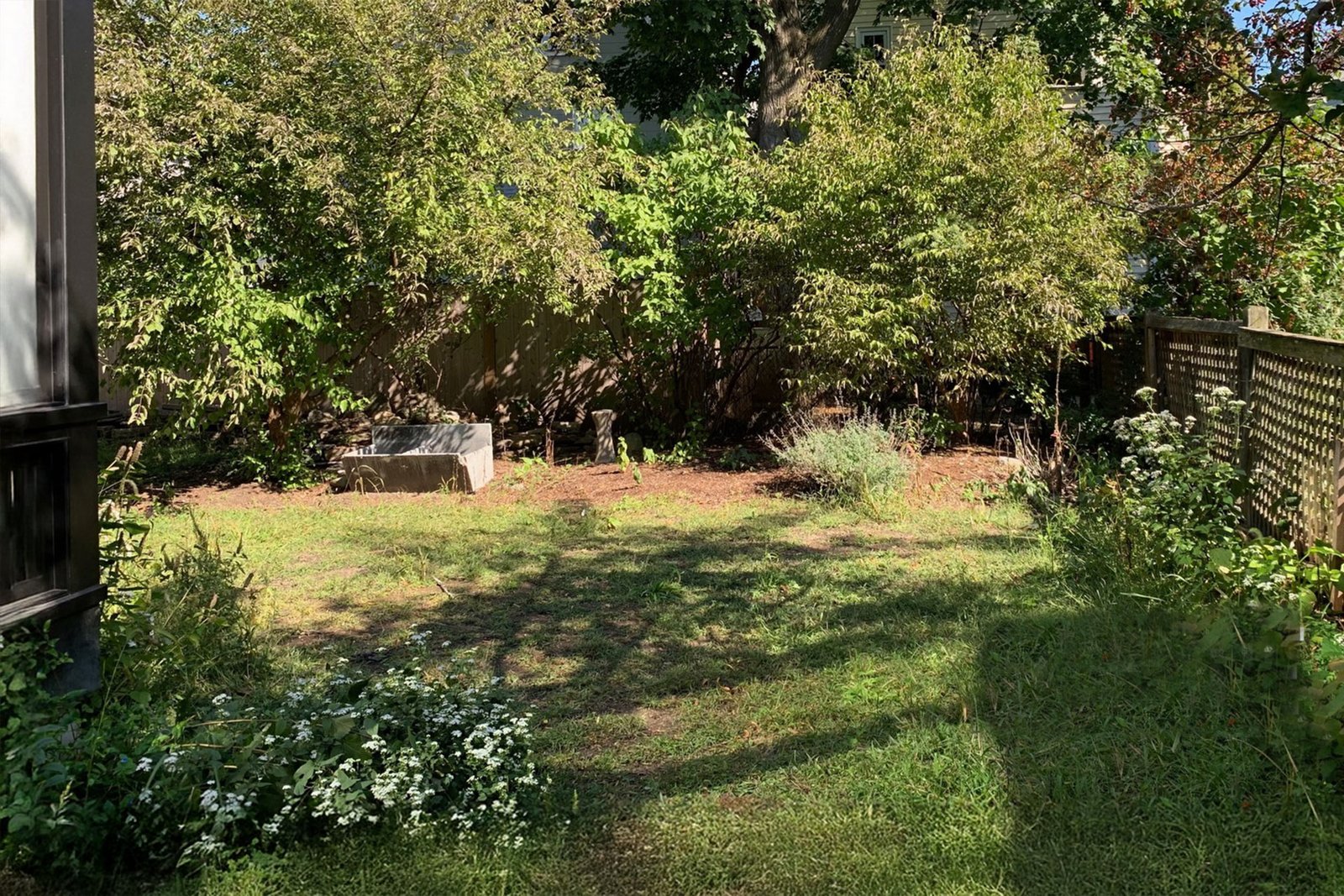 Somerville backyard before compact patio renovation