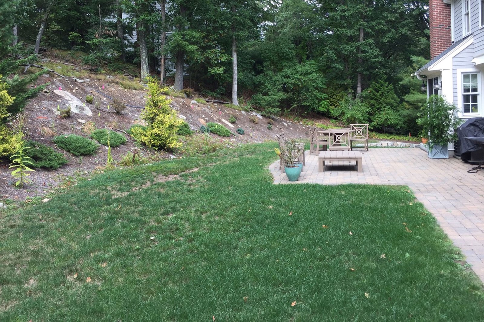 Wellesley backyard patio before terraced transformation