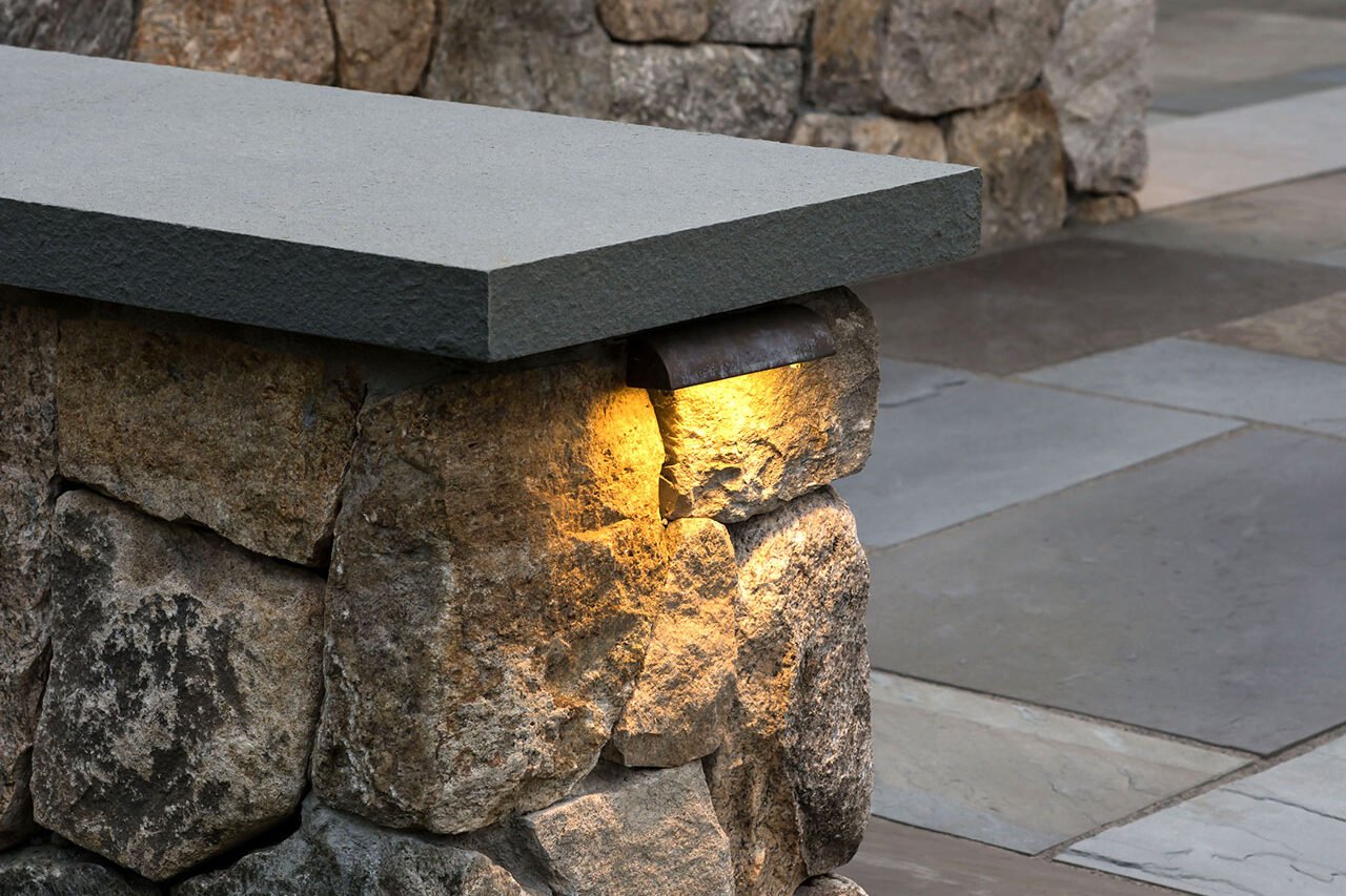 Built-in wall cap lighting softly defines edges while improving safety and nighttime navigation.