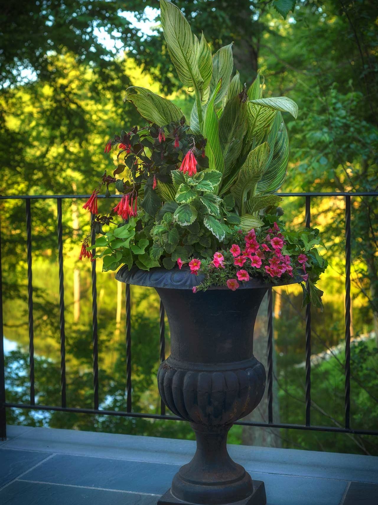 Lincoln, MA - A classic cast iron urn is the perfect way to add pops of seasonal color.