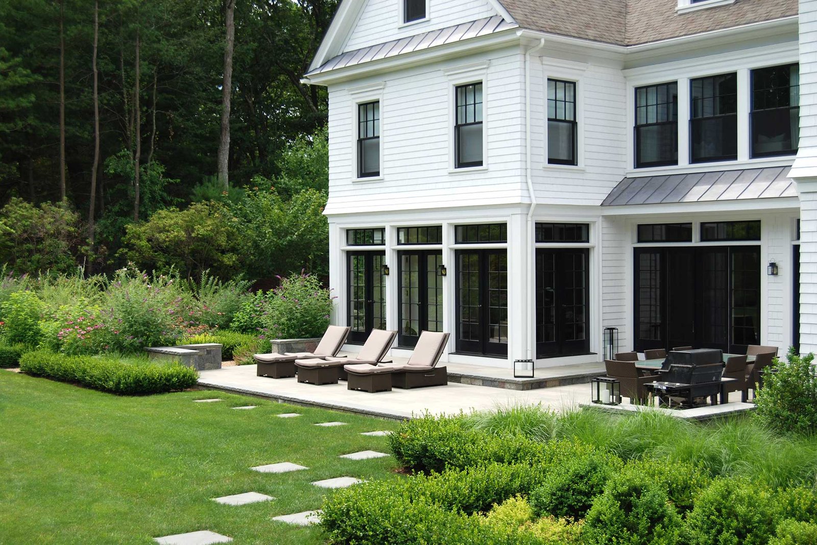 Weston finished backyard with patio and lawn planting