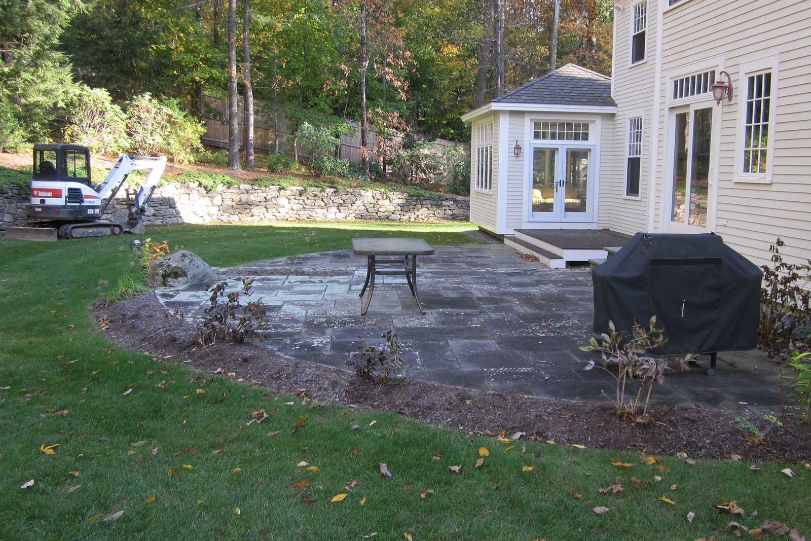 Concord backyard patio before outdoor kitchen and terrace transformation