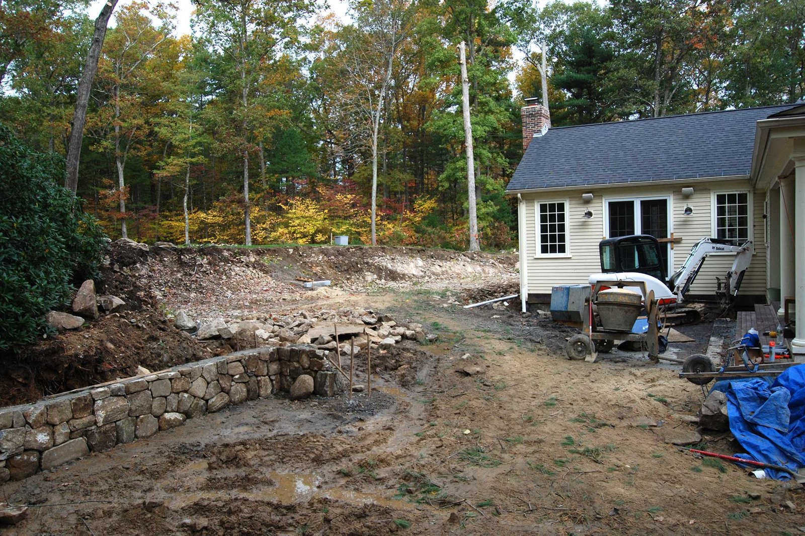 over backyard under construction before walls and patio installation