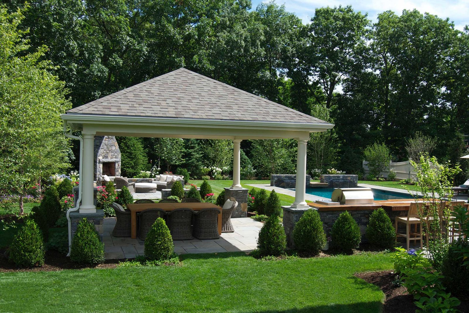 Westwood backyard with pavilion, pool, and outdoor fireplace